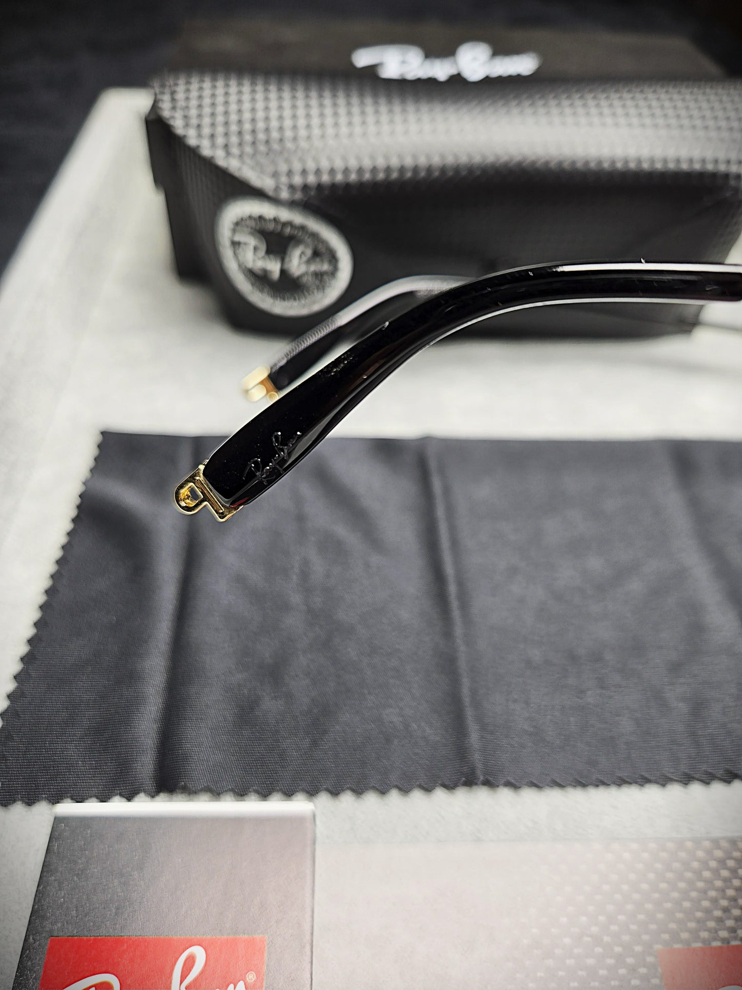 Ray-Ban Black Frame Glasses with Purple-Tinted Lenses