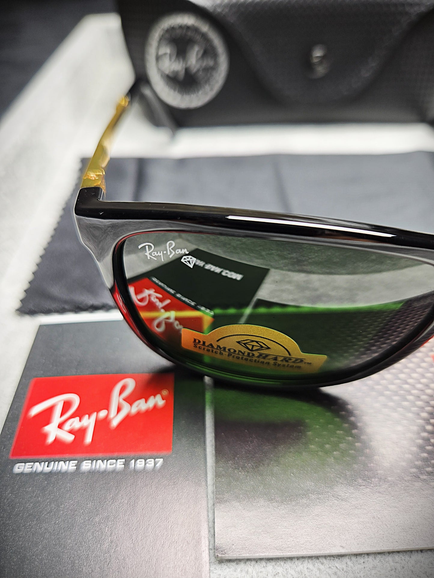 Ray-Ban Black Lenses with Black Frame and Gold Temples