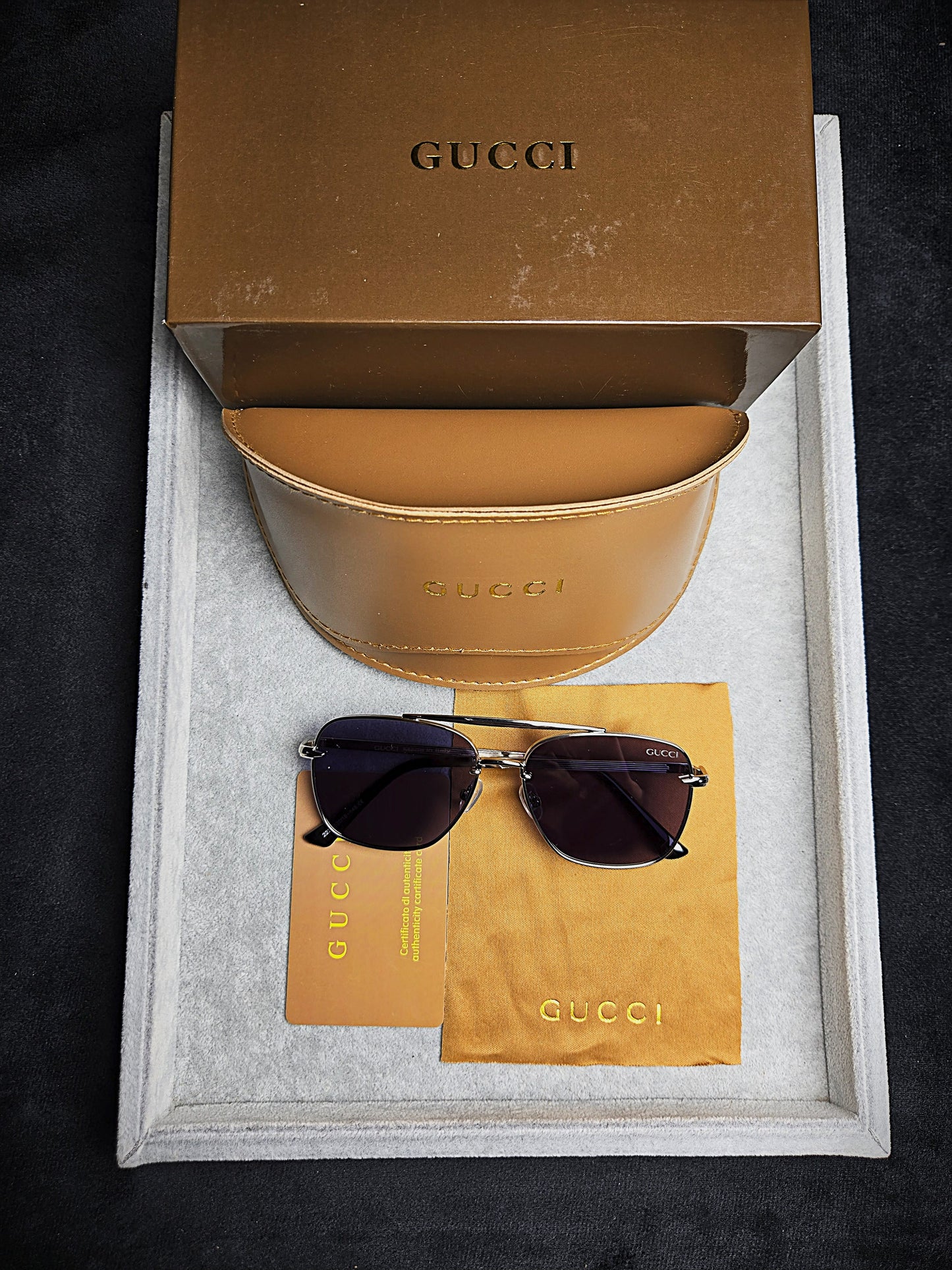 Gucci Black Oval Sunglasses